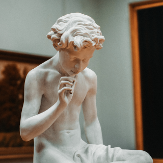 Marble statue of a boy